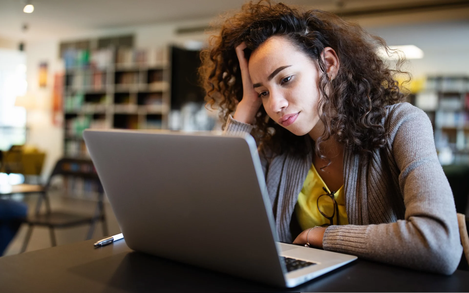 woman looking at computer screen