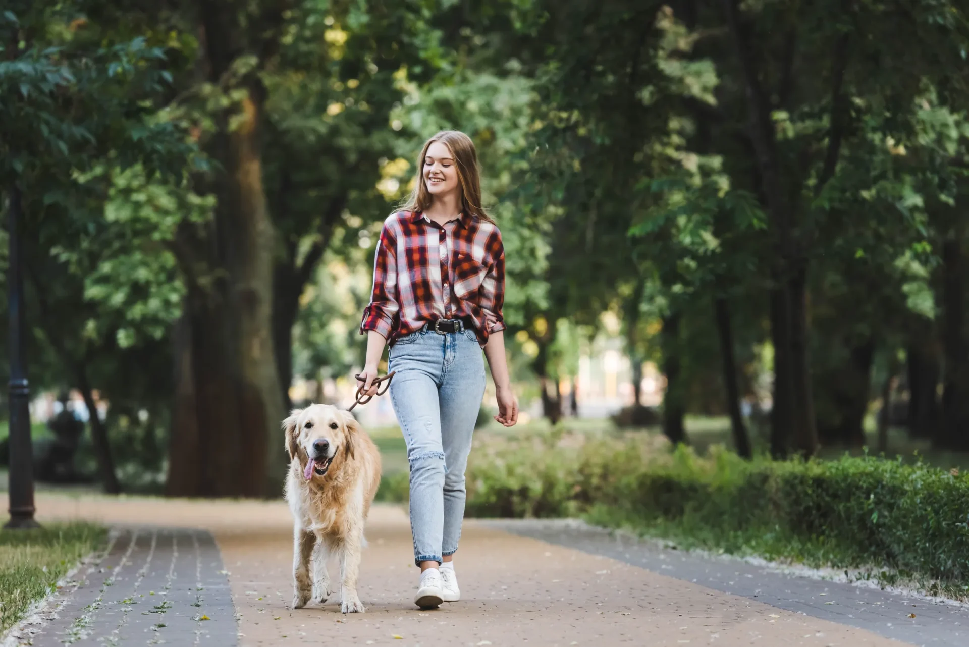 Woman walking with dog