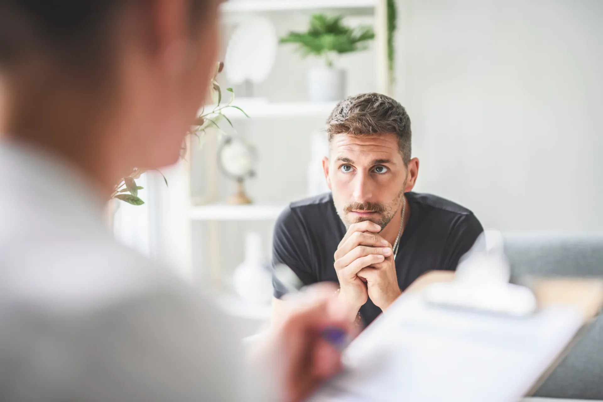 male patient listening intently