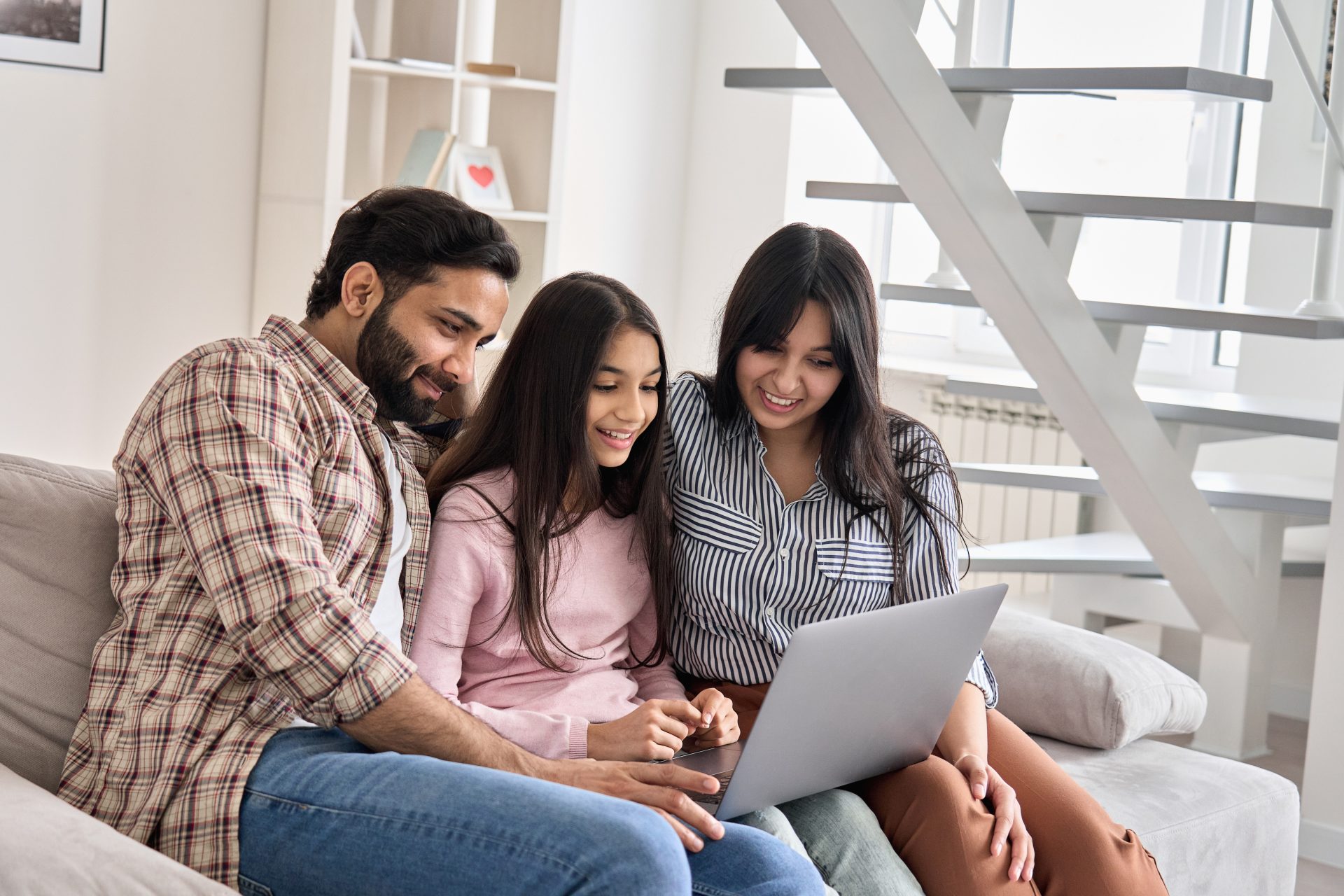 Family in telehealth therapy session